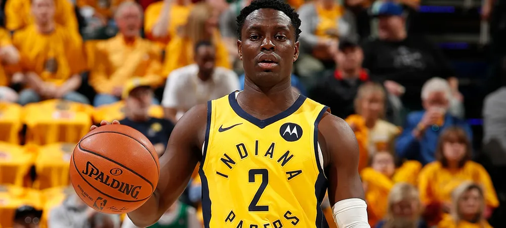 Darren Collison é visto com Jeanie Buss e Kurt Rambis